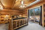 Log cabing feel at its best in this bedroom